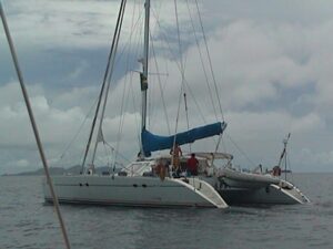 jeannea 55 white with cloudy sky and flat water