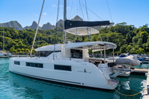 lagoon 50 for a yacht delivery solutions skipper with trees in the back ground