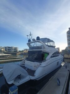 Princess P50 tied to a dock refuelling during a delivery