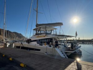 Fountaine Pajot catamaran moored at a marina before an offshore yacht delivery